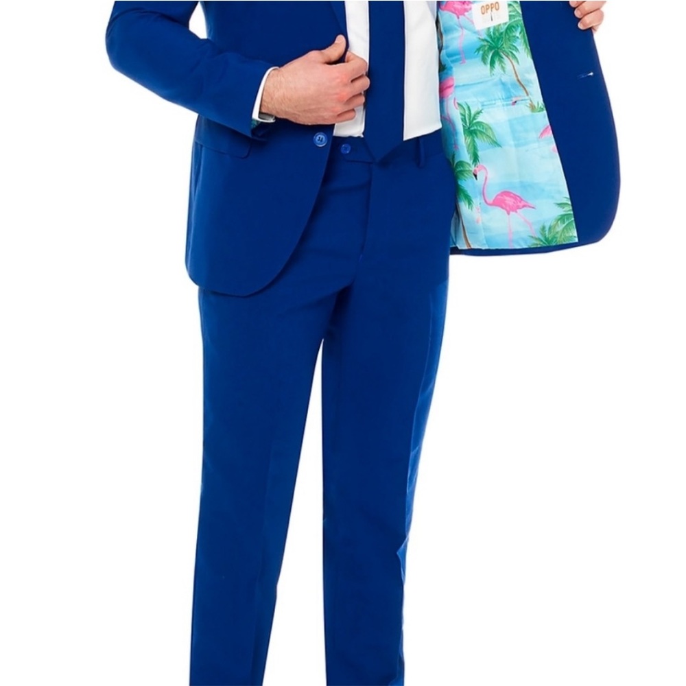 Electric Blue statement suit with flamingo lining.   Size 46 jacket